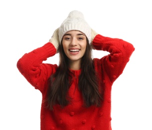 Photo of Young woman wearing warm clothes on white background. Winter season