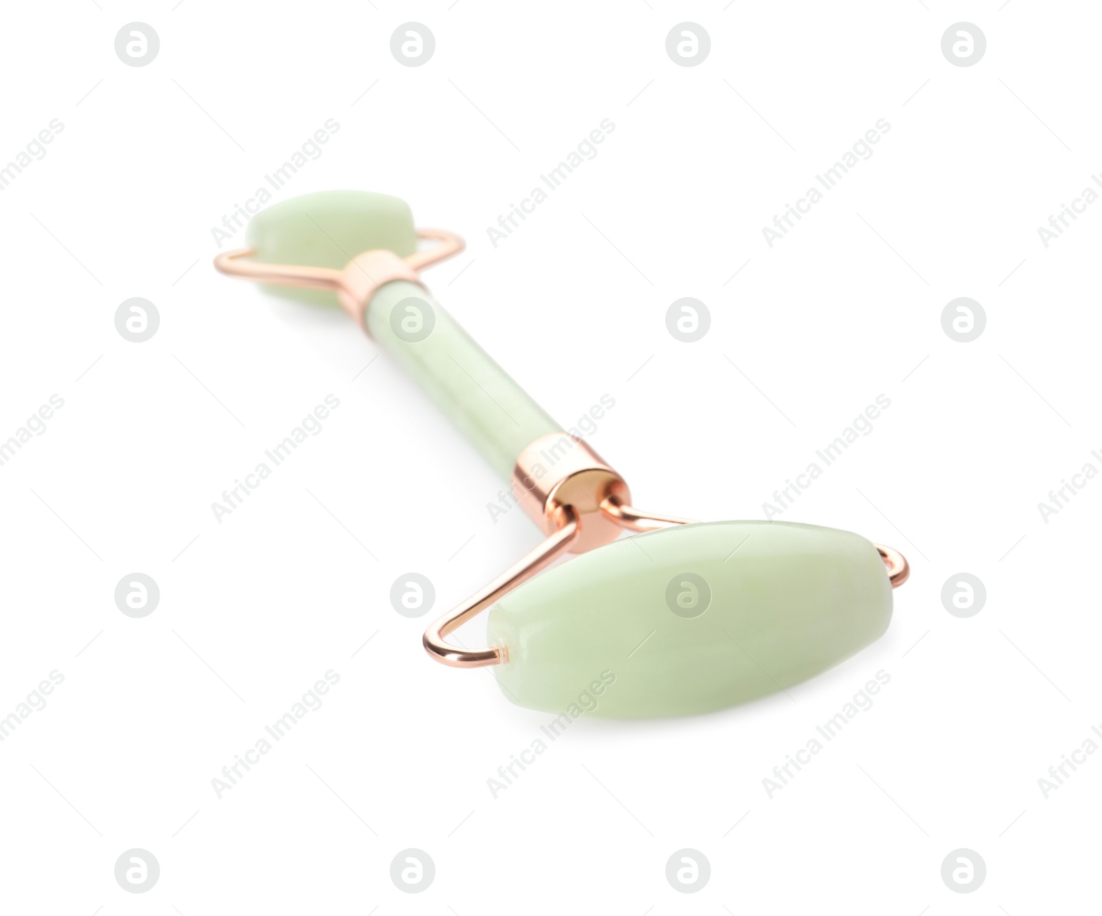 Photo of Natural jade face roller on white background