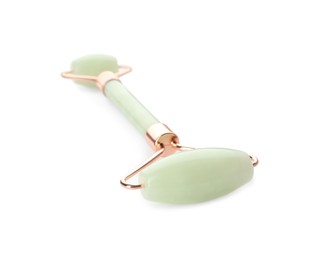 Natural jade face roller on white background