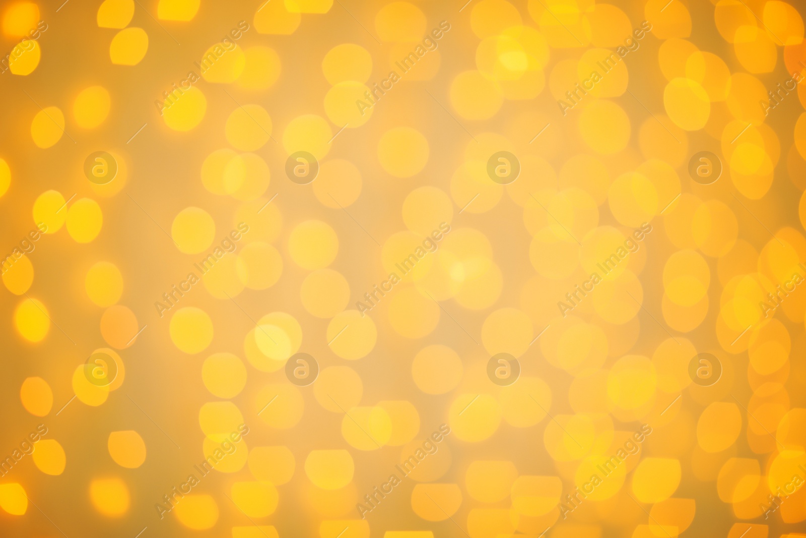 Photo of Beautiful gold lights as background. Bokeh effect