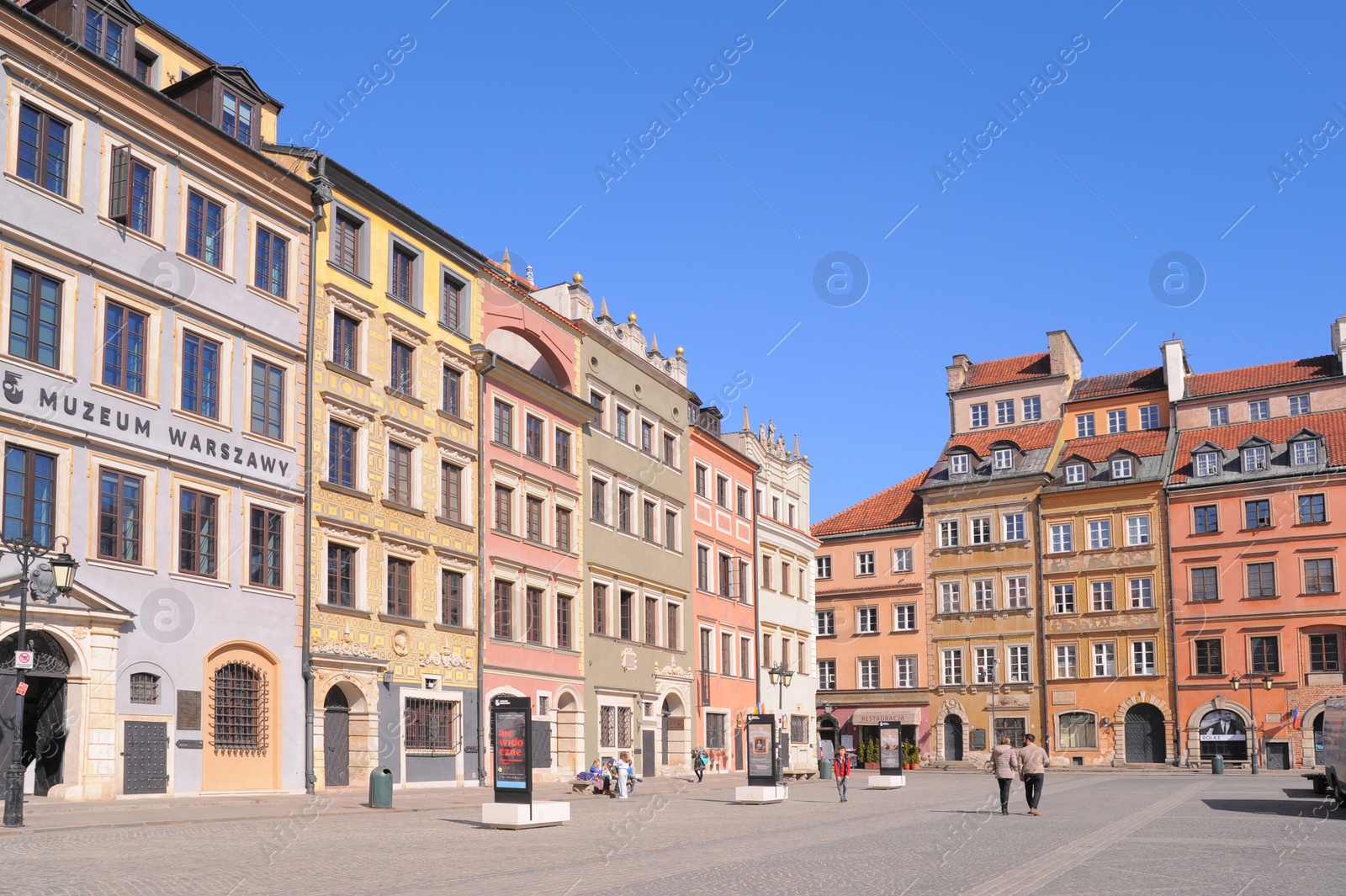 Photo of WARSAW, POLAND - MARCH 22, 2022: Beautiful view of Old Town Square on sunny day