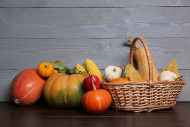 Happy Thanksgiving day. Beautiful composition with pumpkins on wooden table