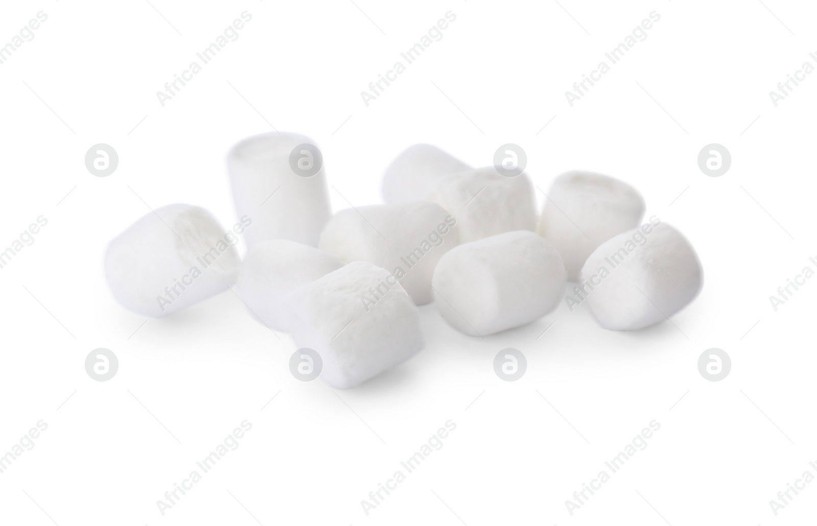 Photo of Delicious sweet puffy marshmallows isolated on white