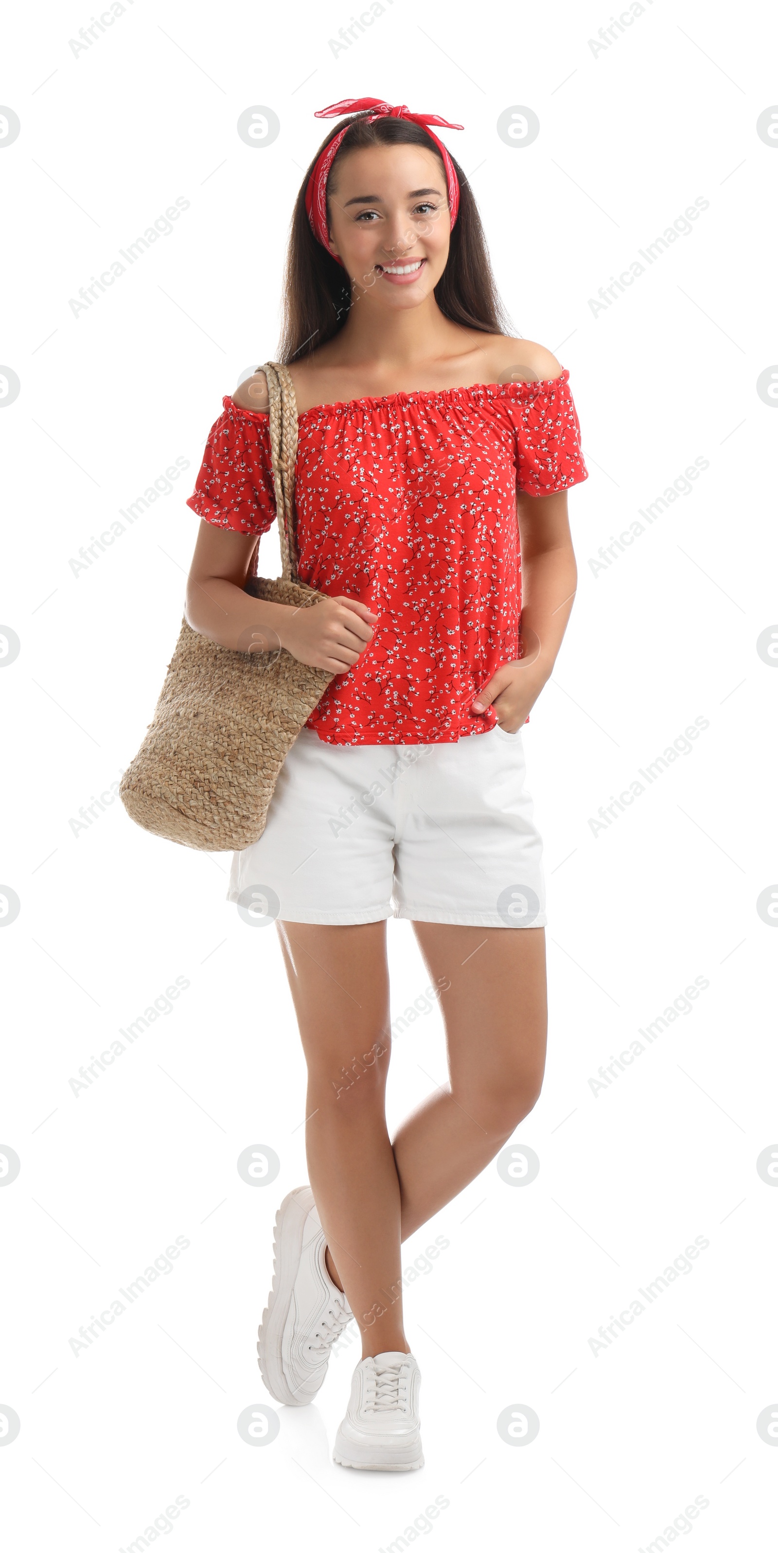 Photo of Young woman with stylish straw bag on white background