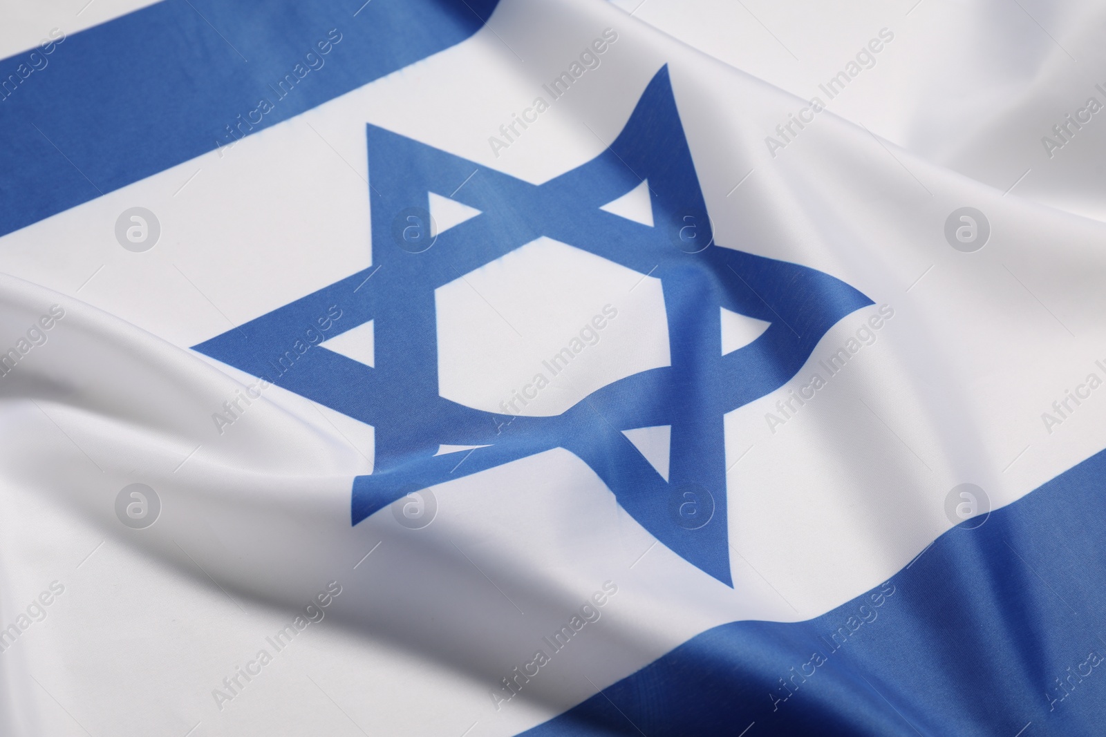 Photo of Flag of Israel as background, closeup. National symbol