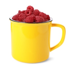 Photo of Mug with ripe raspberries on white background