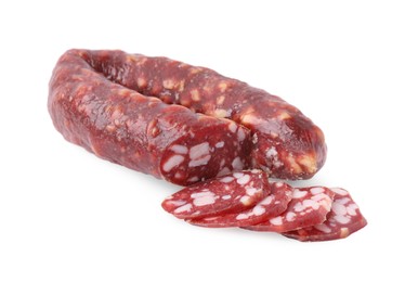 Photo of Delicious cut smoked sausage isolated on white