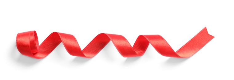 Photo of Simple red ribbon on white background, top view