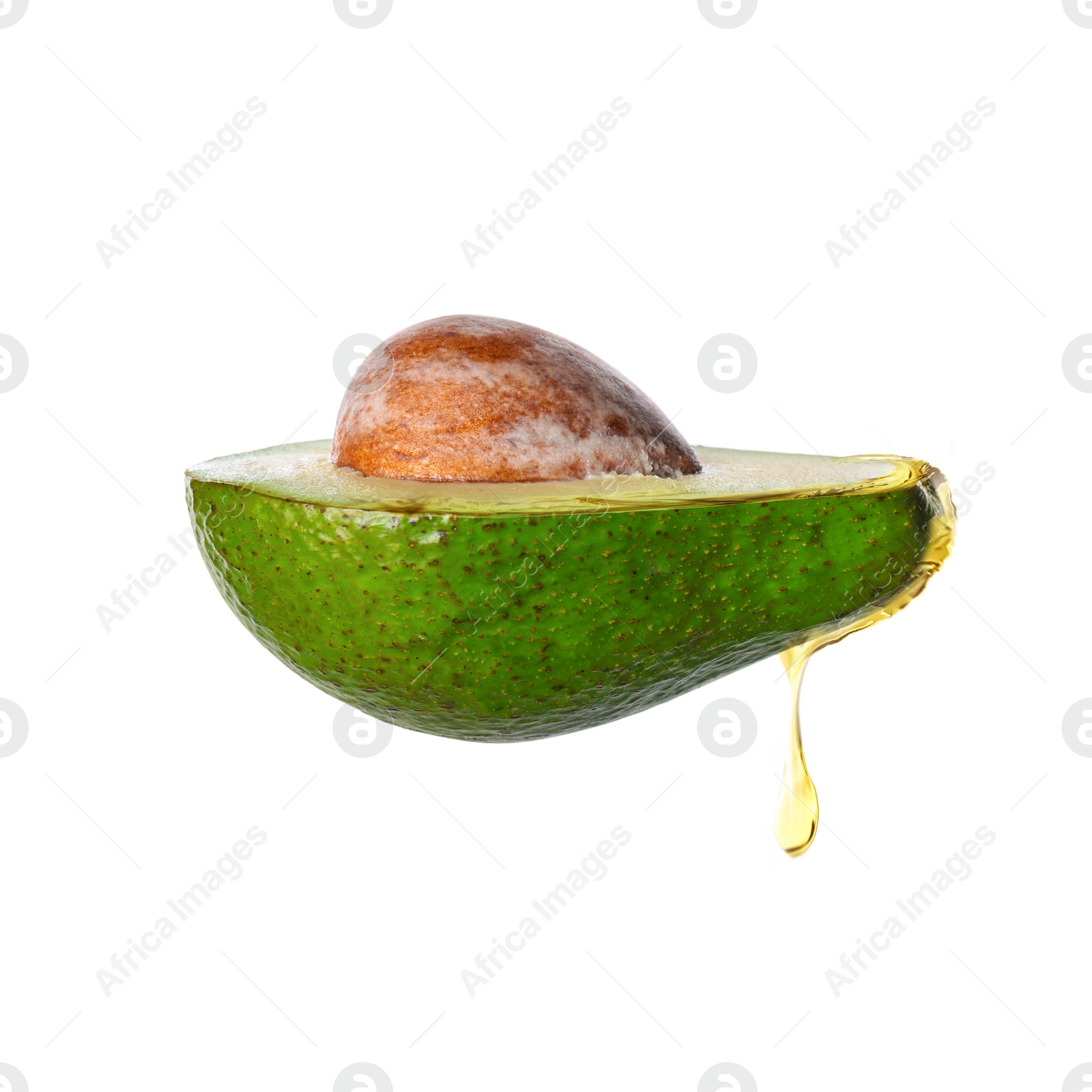 Image of Fresh avocado with dripping oil on white background