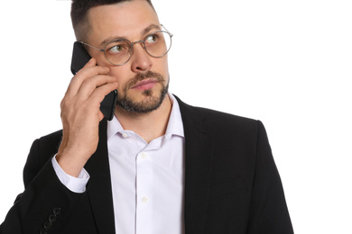 Businessman in glasses talking on smartphone against white background, closeup