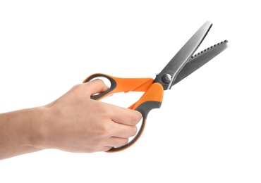 Photo of Woman holding scissors on white background, closeup