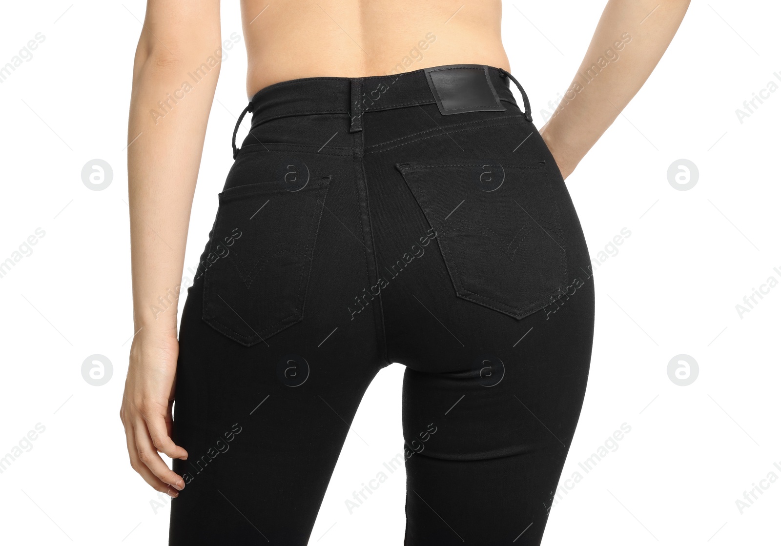 Photo of Woman wearing stylish black jeans on white background, closeup