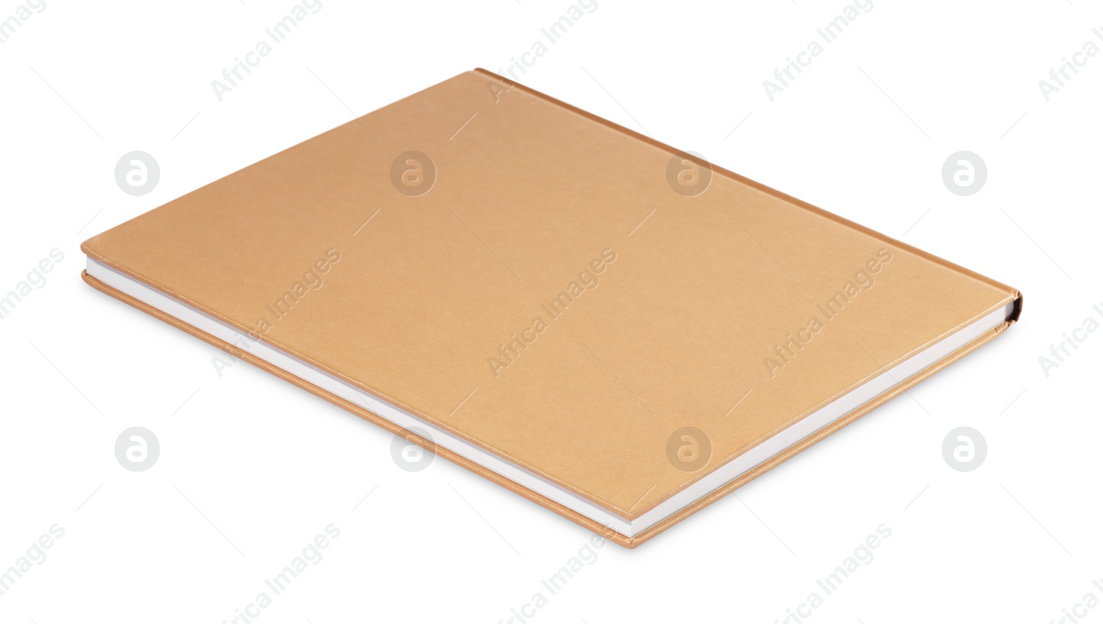 Photo of One closed beige hardcover book isolated on white