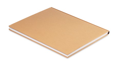 One closed beige hardcover book isolated on white