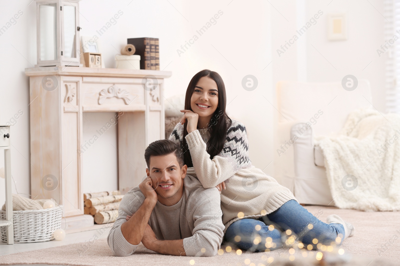 Photo of Happy couple spending time together at home. Winter vacation