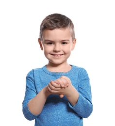 Little boy showing BELIEVE gesture in sign language on white background