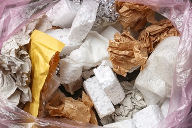 Pile of different garbage as background, top view. Recycling problem