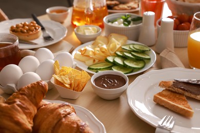 Photo of Dishes with different food on table. Luxury brunch