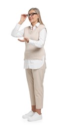 Photo of Full length portrait of senior woman on white background