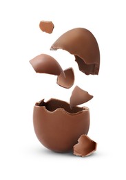 Image of Exploded milk chocolate egg on white background