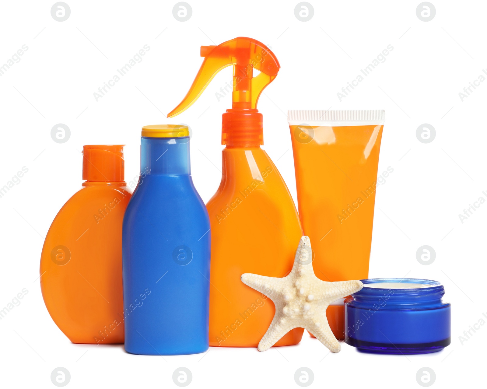 Photo of Composition with sun protection cosmetic products and starfish on white background