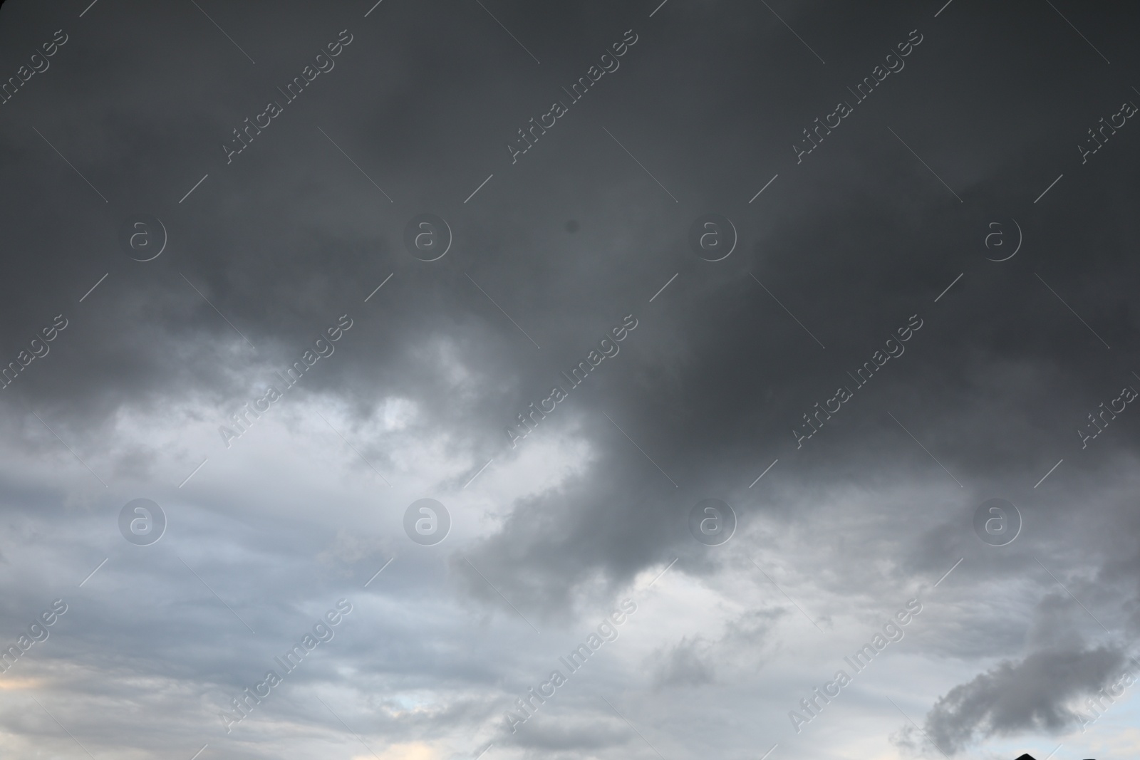 Photo of Picturesque view of sky with heavy rainy clouds