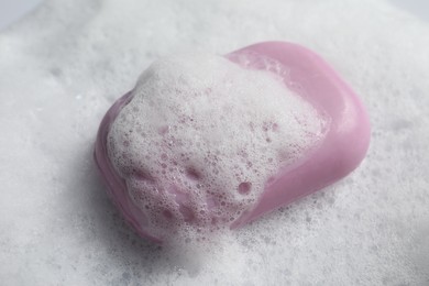 Photo of Closeup view of soap and fluffy foam