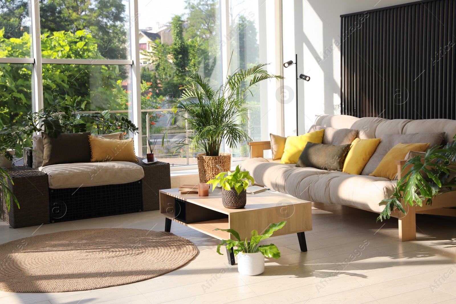 Photo of Indoor terrace interior with modern furniture and houseplants