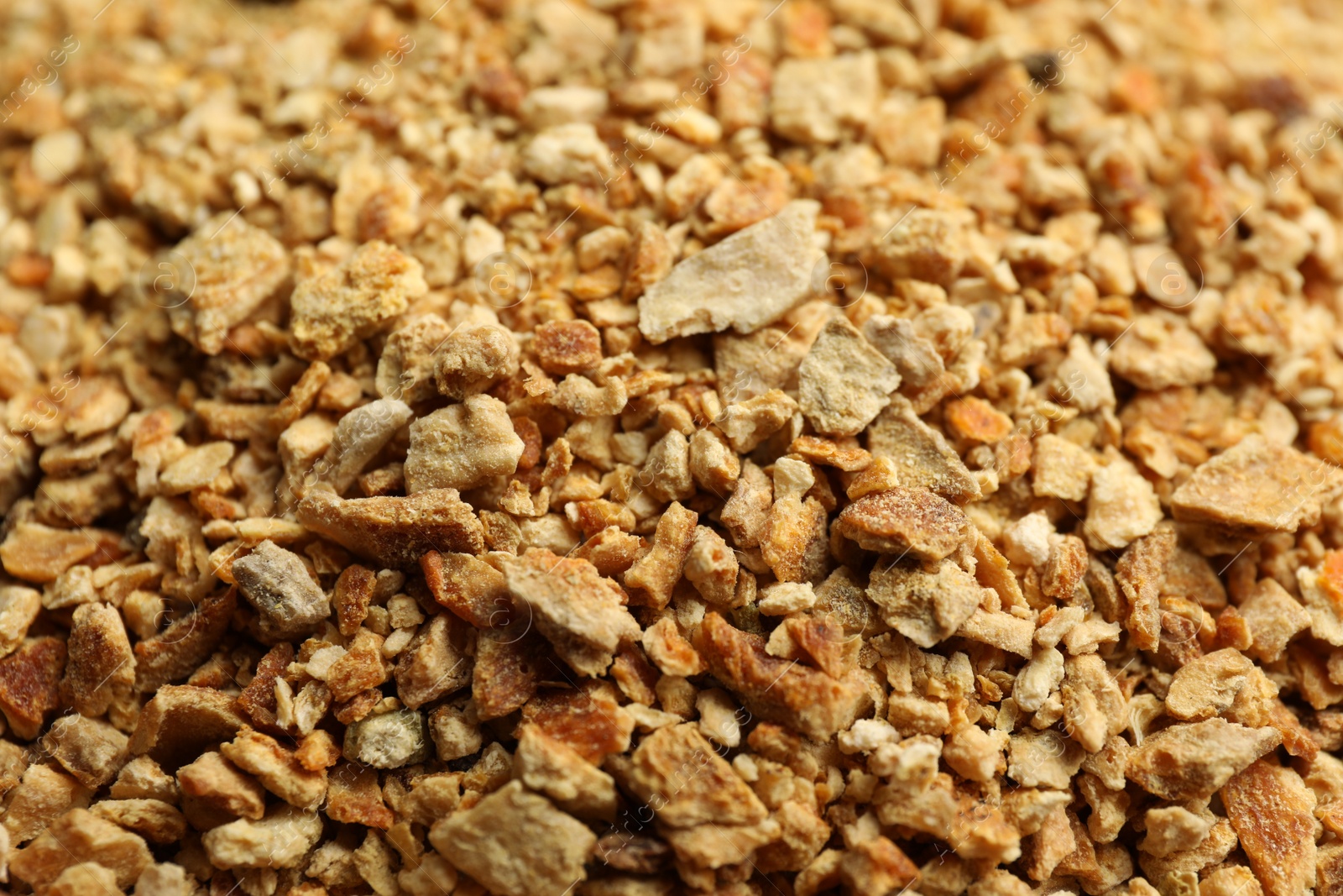 Photo of Dried orange zest seasoning as background, closeup