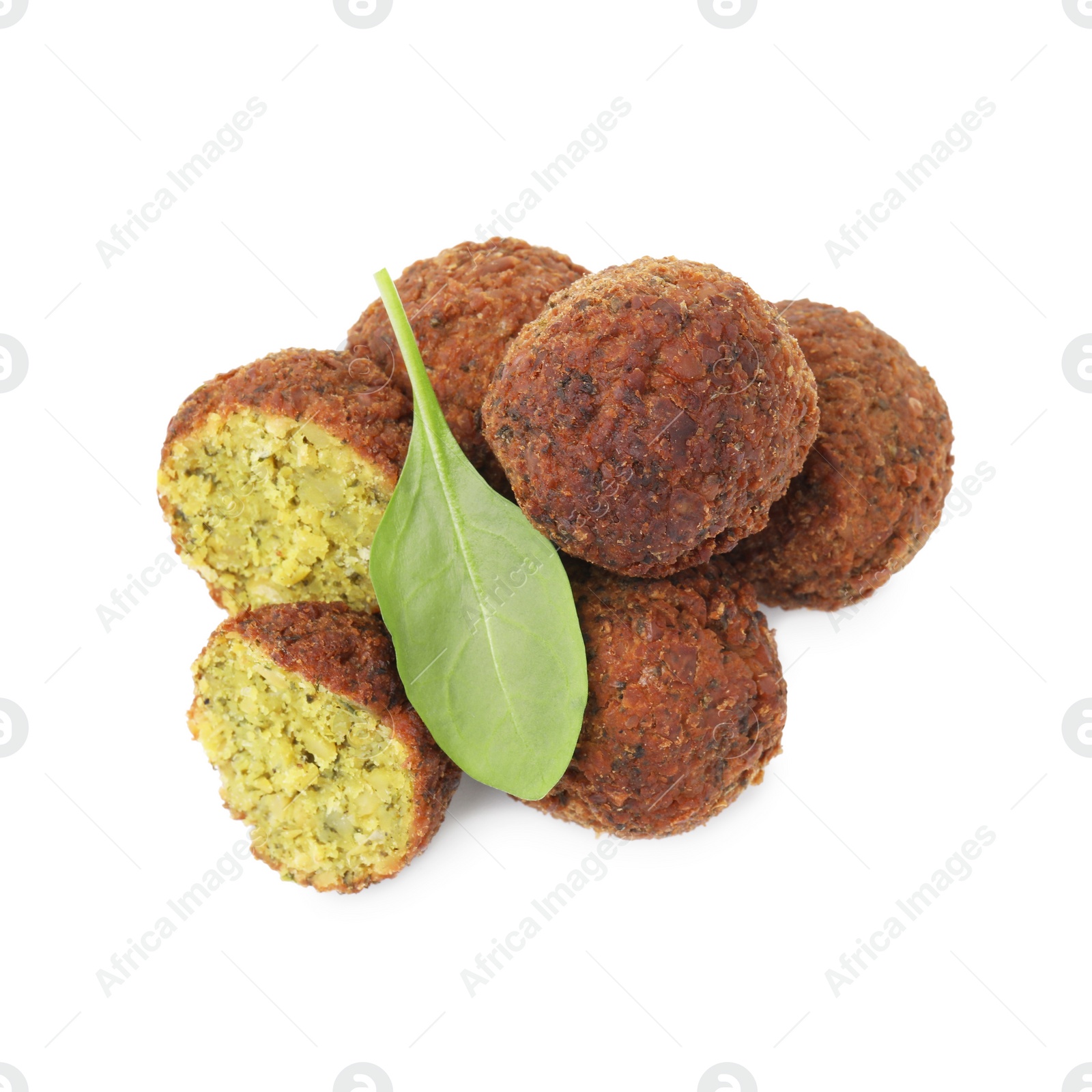 Photo of Delicious falafel balls and basil isolated on white, top view