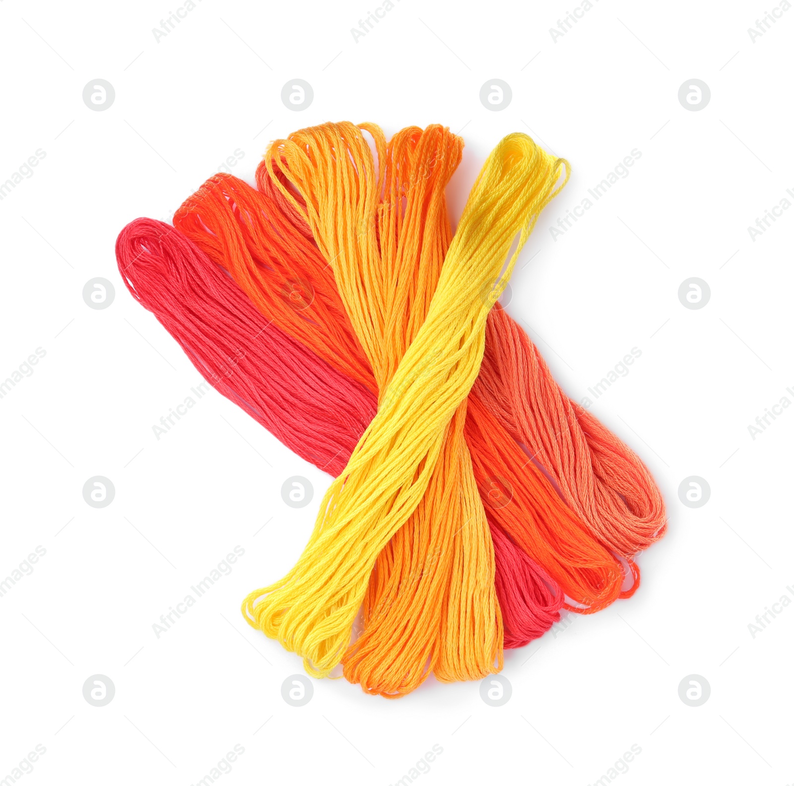 Photo of Different colorful embroidery threads on white background, top view