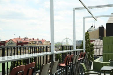 Observation area cafe. Chairs on terrace against beautiful cityscape