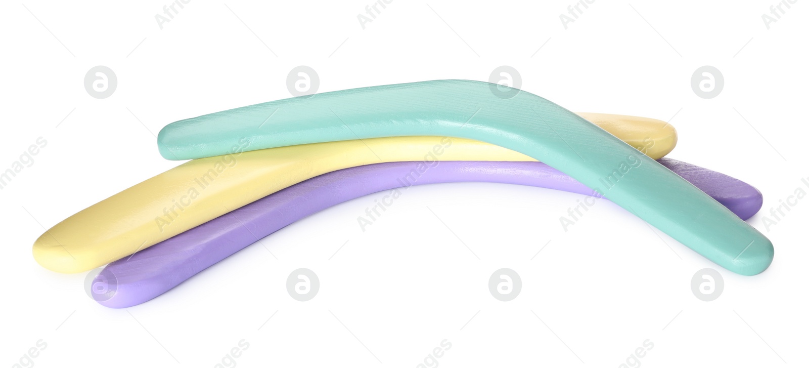 Photo of Set of color boomerangs on white background