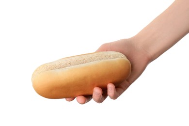 Woman with fresh hot dog bun on white background, closeup