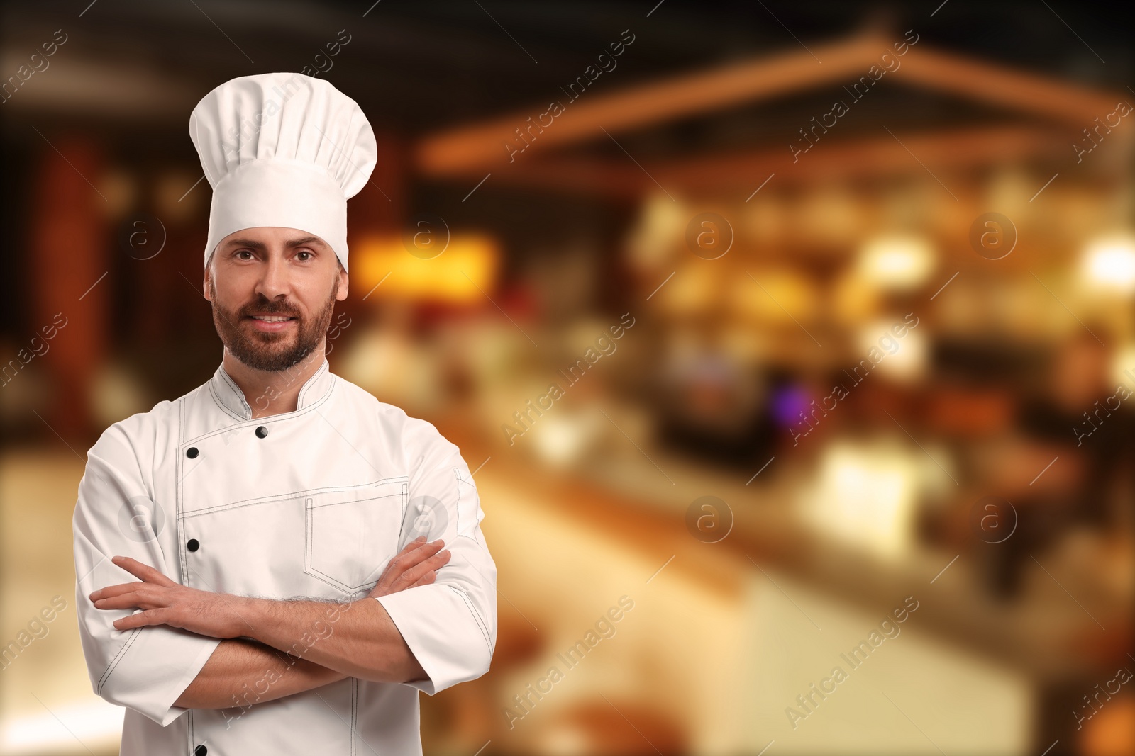 Image of Smiling chef in uniform at restaurant, space for text