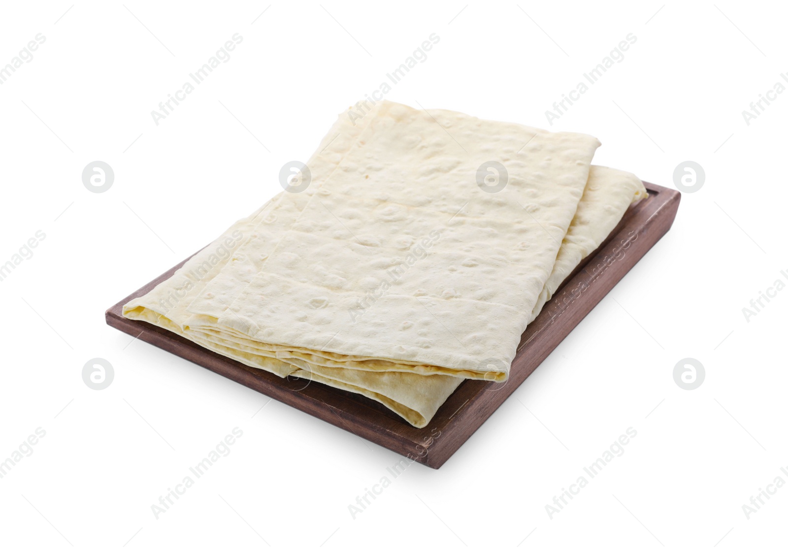 Photo of Wooden tray with delicious Armenian lavash on white background