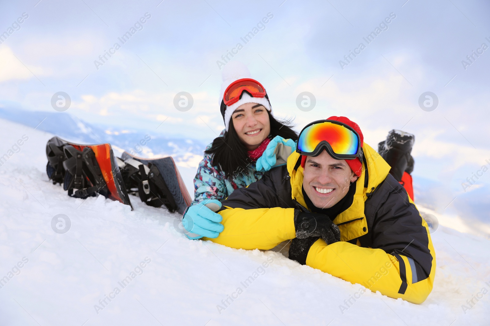 Photo of Lovely couple on snowy hill. Winter vacation