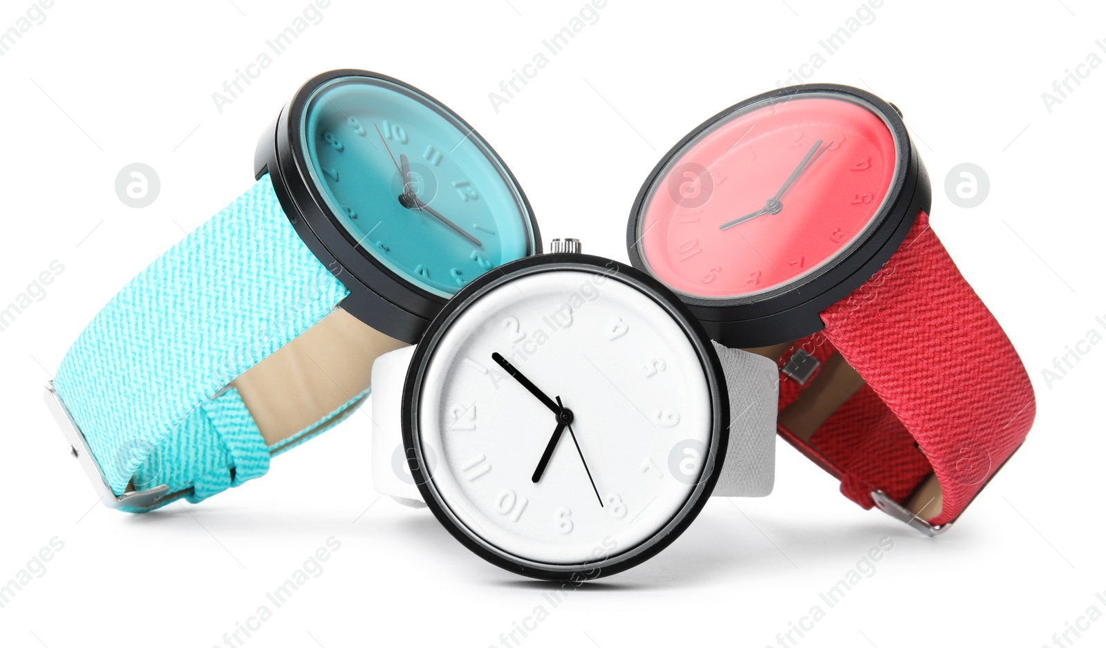 Photo of Stylish colorful wrist watches on white background. Fashion accessory