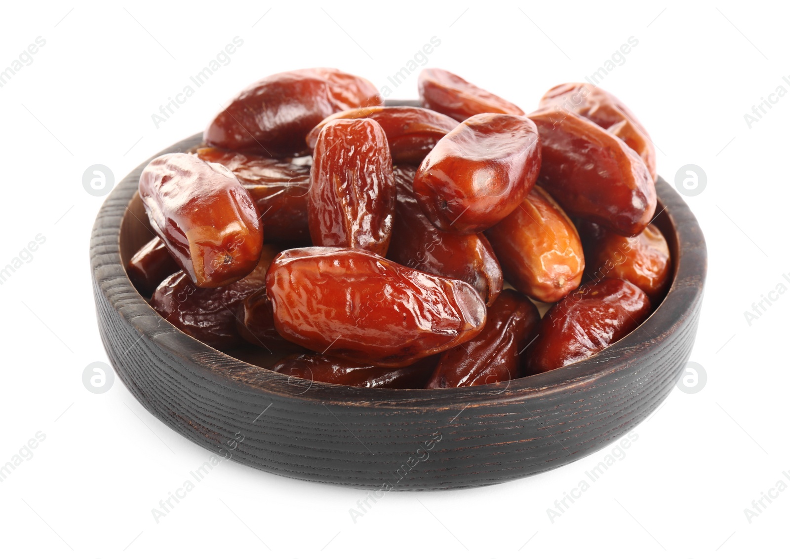 Photo of Tasty sweet dried dates in wooden bowl on white background