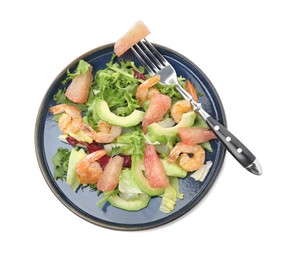 Delicious pomelo salad with shrimps and fork on white background, top view