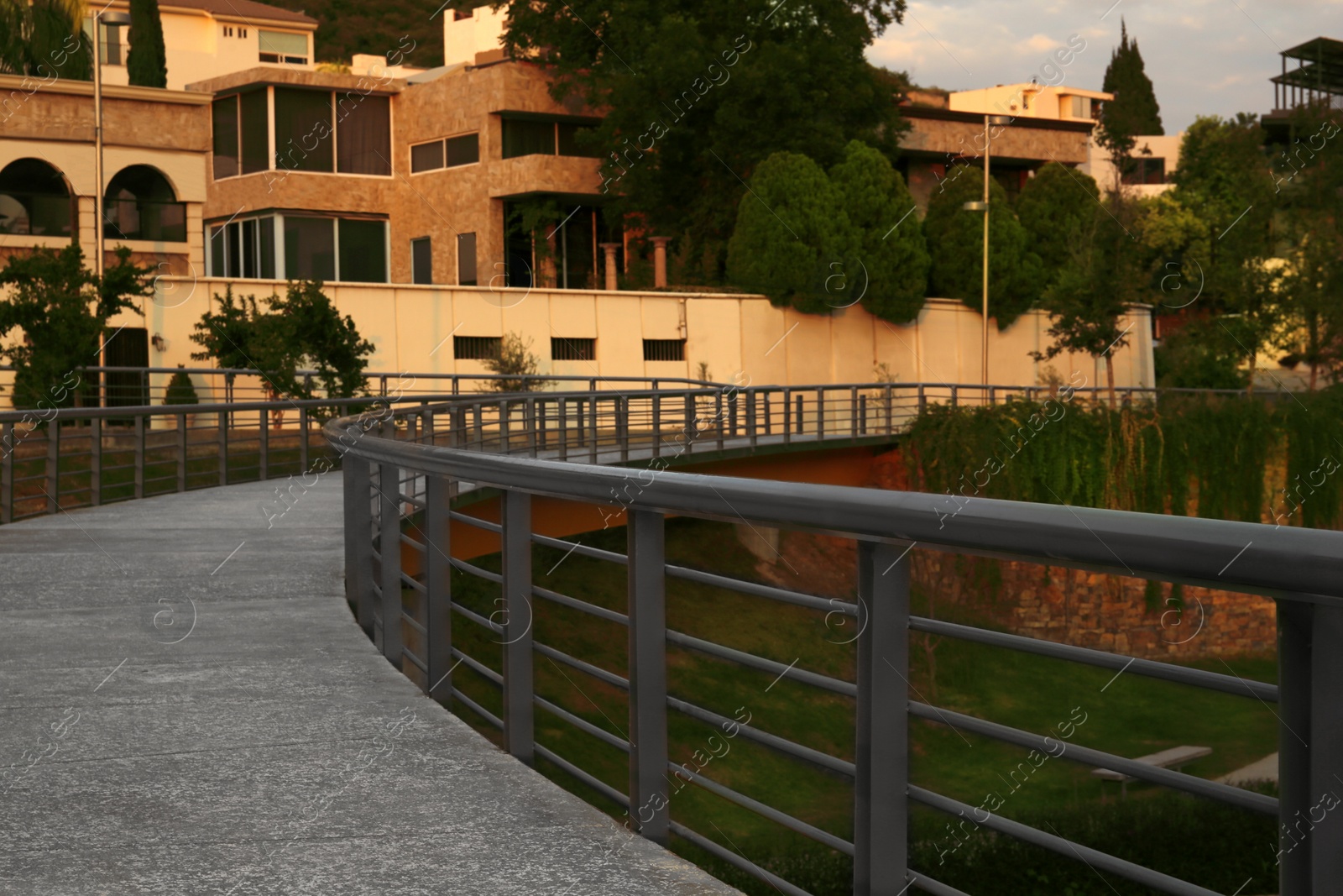 Photo of Picturesque view of bridge in beautiful park