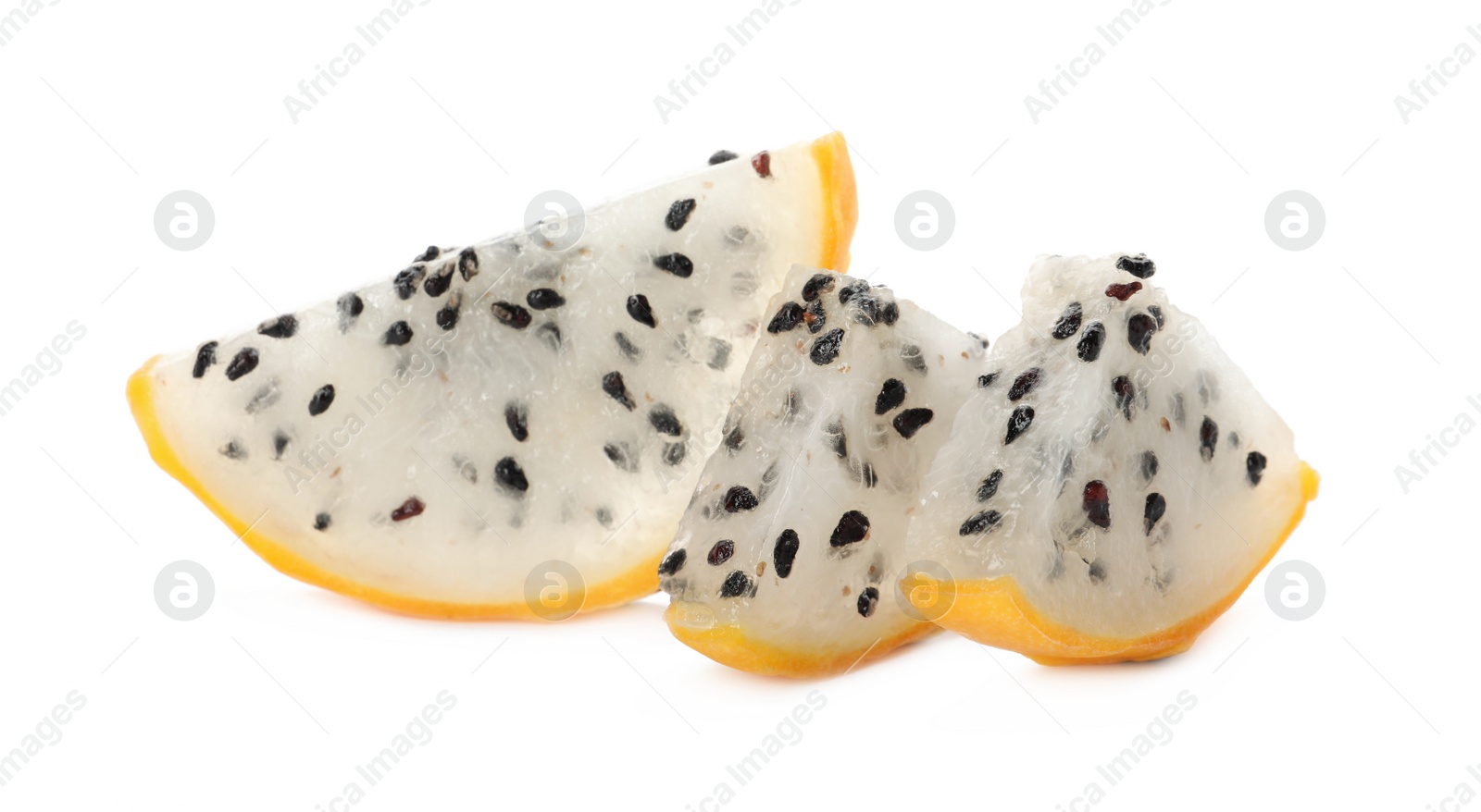 Photo of Slices of delicious yellow pitahaya fruit on white background