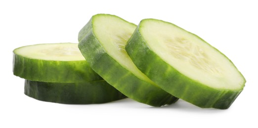 Photo of Slices of fresh cucumber isolated on white