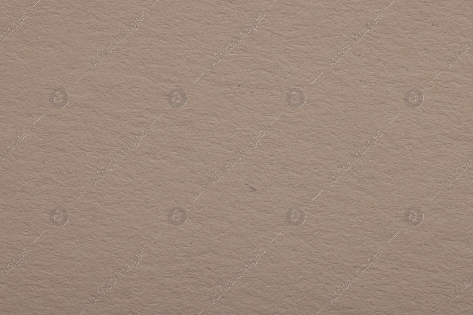 Photo of Texture of light grey paper sheet as background, top view