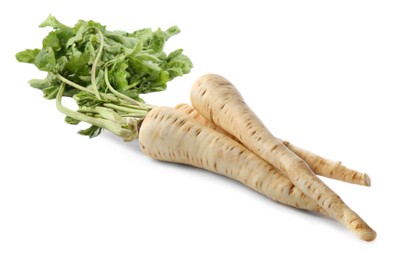 Photo of Tasty fresh ripe parsnips on white background