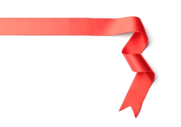 Photo of Simple red ribbon on white background, top view. Festive decoration