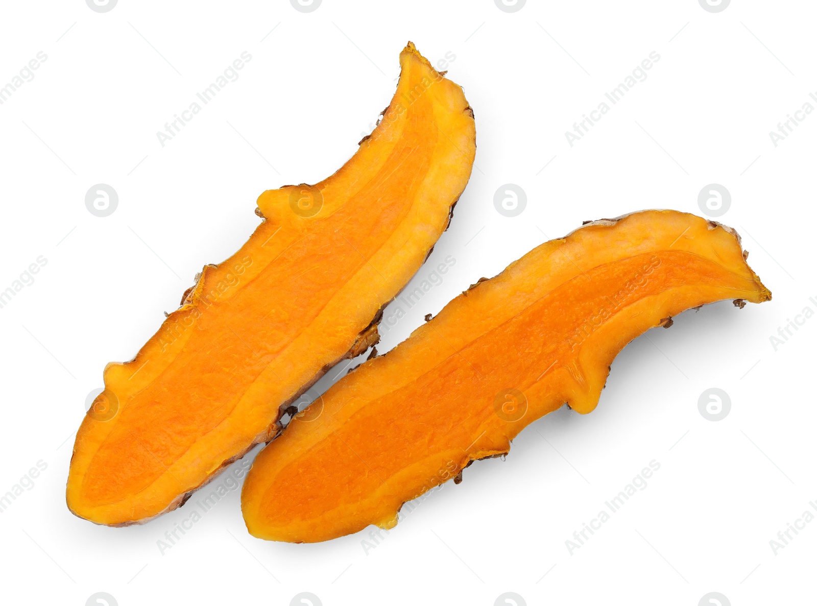 Photo of Fresh cut turmeric root isolated on white, top view