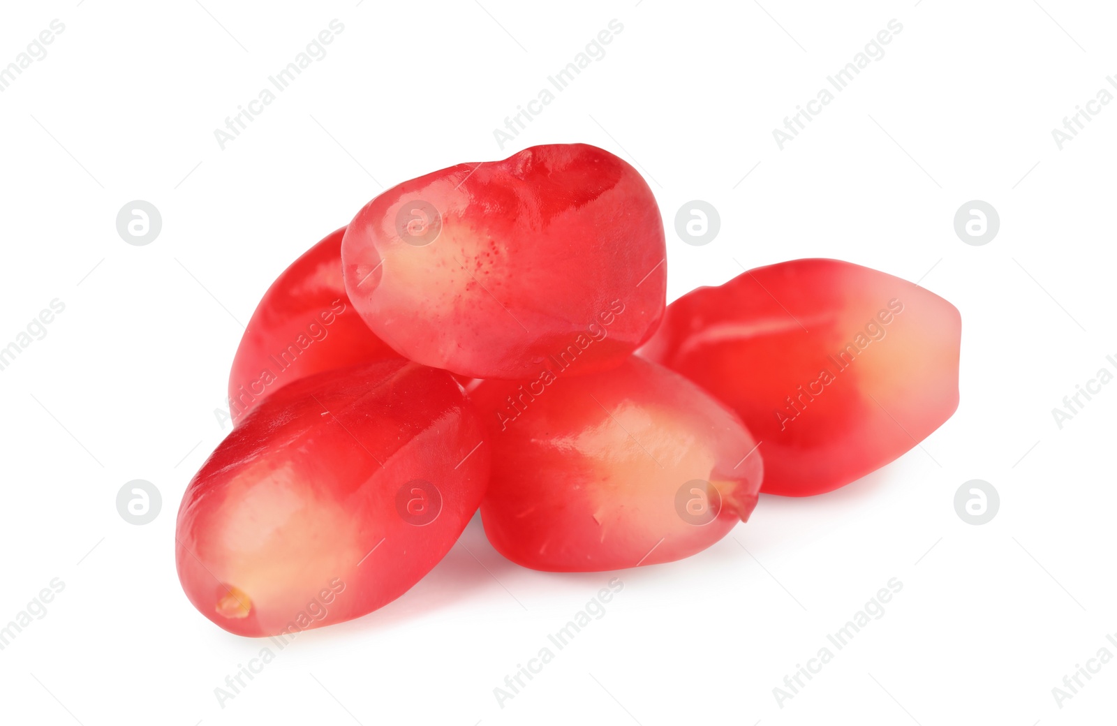 Photo of Juicy red pomegranate seeds on white background