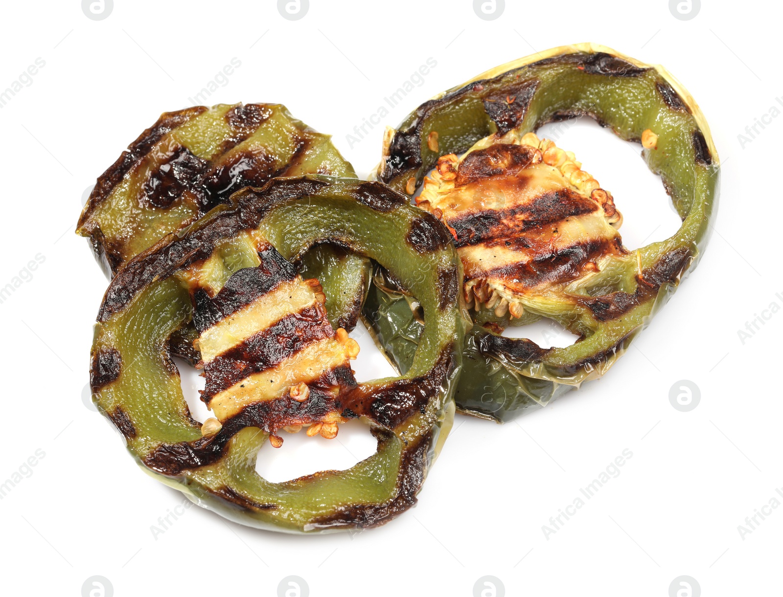 Photo of Slices of grilled green chili pepper isolated on white