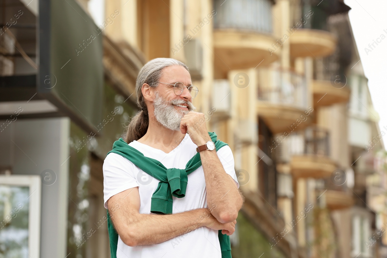 Photo of Handsome bearded mature man, outdoors